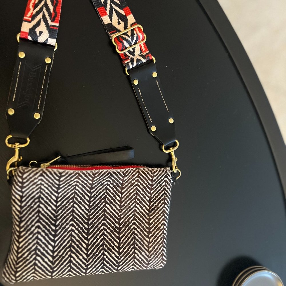 Hand-made leather and calf hair clutch with cross-body